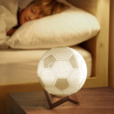 Personalized 3D football LED night light
Custom football lamp with remote control
Acrylic football night light with wooden base
Football themed bedroom decor lamp
Personalized sports LED table lamp close up