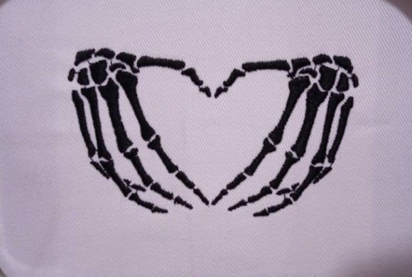 Spooky embroidered skeleton hands artwork