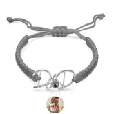 Braided bracelet with hidden photo projection